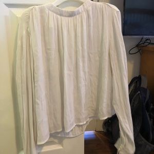 White long sleeved high neck top
